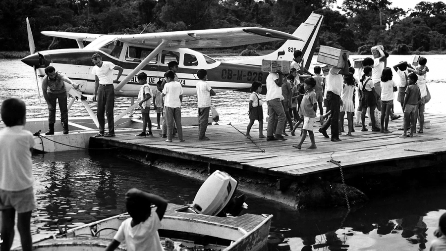 Float plane docked in the Amazon.